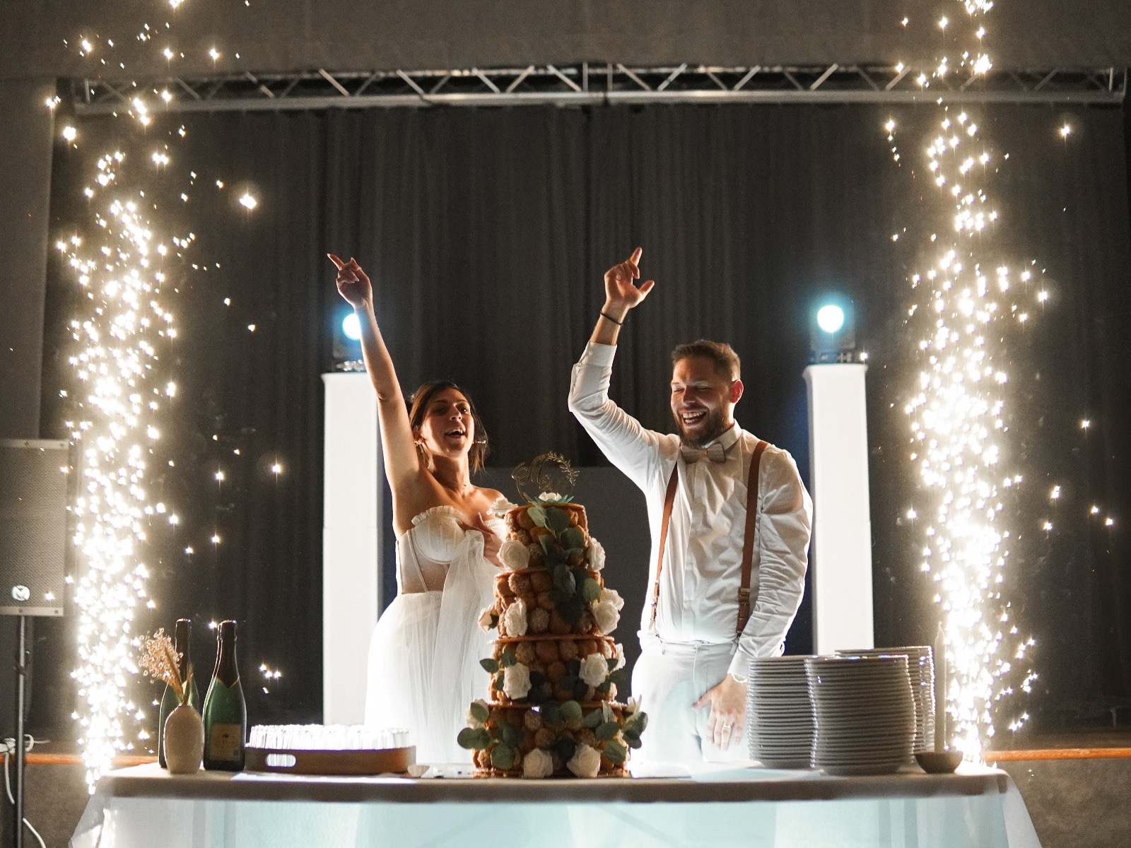 Newlyweds in front of cold sparks