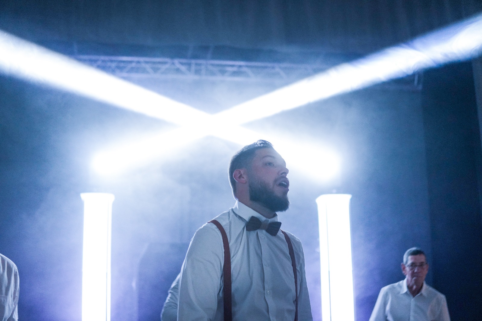 Crossed light beams above the dance floor